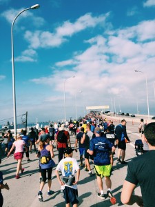 Runners over bridge